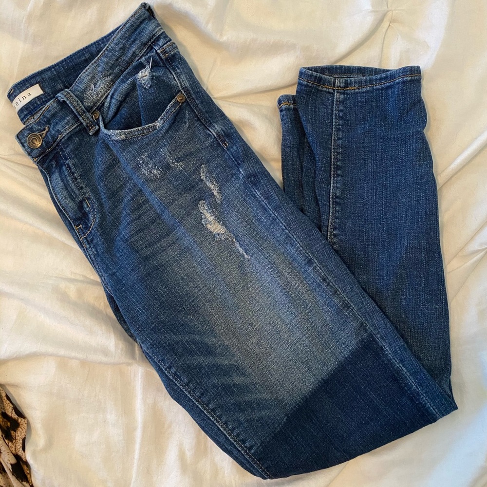 Slight distressed jeans with knee patch